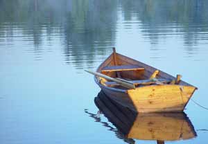 Rowboat on a calm, peaceful lake